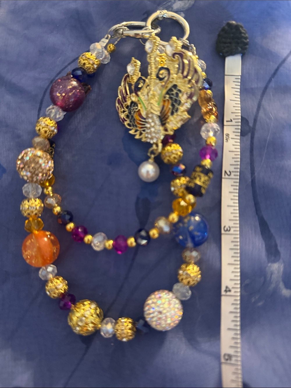 Phoenix Gold Multi-Color Beaded Statement Bracelet with Peacock Charm
